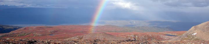 A rainbow high in the Chugach Mountains above the Copper River, one of the places on Planet Earth worth saving